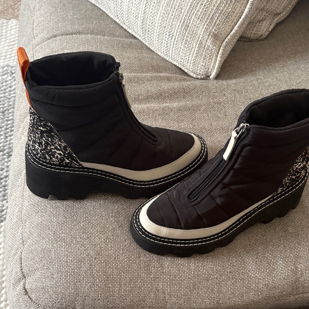 Black, gray with a splash of heel print.